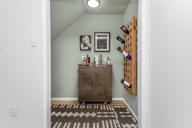 5845 E University Blvd Unit A, Dallas, TX 75206 - indoor dry bar featuring vaulted ceiling and baseboards