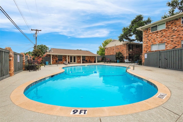 5845 E University Blvd Unit A, Dallas, TX 75206 - community pool featuring a patio and fence