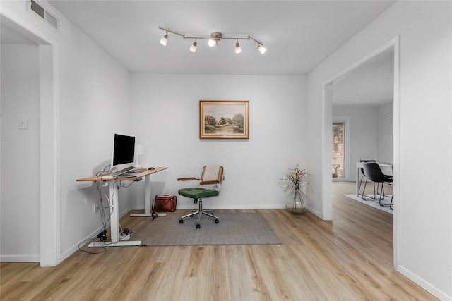 5845 E University Blvd Unit A, Dallas, TX 75206 - home office featuring wood finished floors and baseboards