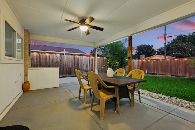 view of patio / terrace with ceiling fan and outdoor dining area