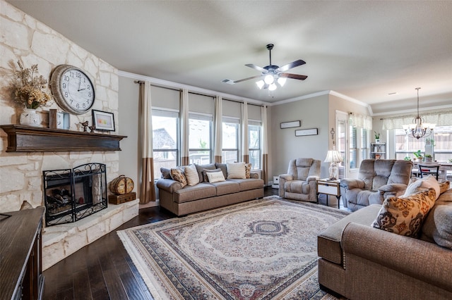 5912 Trail Marker Ct, Fort Worth, TX 76123 - living area featuring ceiling fan, dark wood-style flooring, a stone fireplace, crown molding, and a chandelier