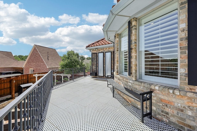 view of patio / terrace featuring a balcony