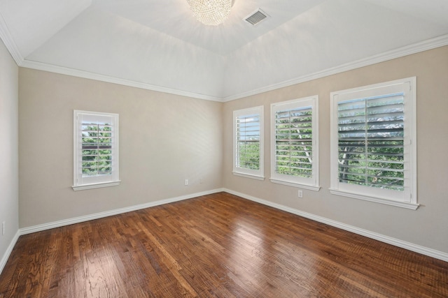 unfurnished room with wood finished floors, a chandelier, baseboards, and ornamental molding