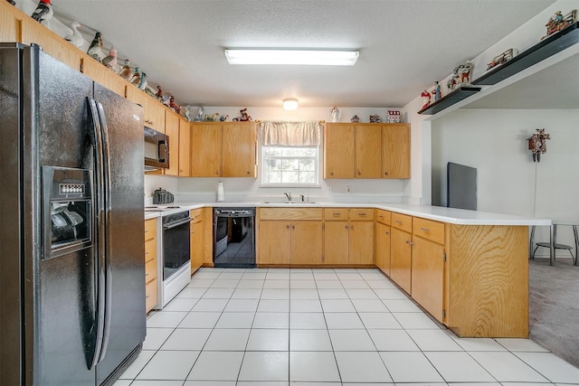 1409 Robyn Rd, Azle, TX 76020 - kitchen featuring black appliances, a peninsula, light countertops, a sink, and a textured ceiling