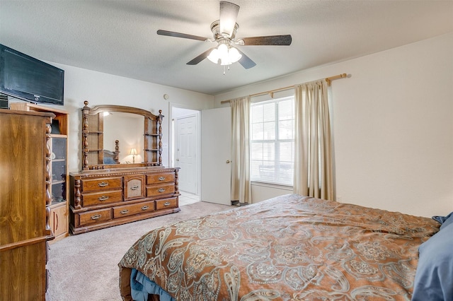 1409 Robyn Rd, Azle, TX 76020 - carpeted bedroom with a textured ceiling and a ceiling fan
