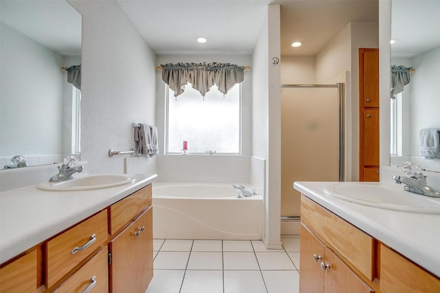 1409 Robyn Rd, Azle, TX 76020 - full bathroom with a stall shower, tile patterned floors, a garden tub, two vanities, and recessed lighting