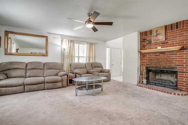 1409 Robyn Rd, Azle, TX 76020 - living area with ceiling fan, carpet floors, a fireplace, and a textured ceiling