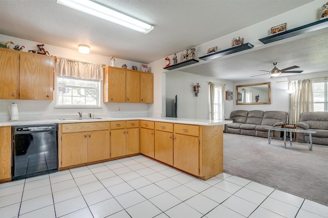 1409 Robyn Rd, Azle, TX 76020 - kitchen with dishwasher, light colored carpet, a sink, a peninsula, and light countertops