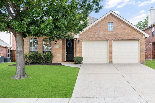 6126 Holly Crest Ln, Sachse, TX 75048 - view of front facade with an attached garage, driveway, a front yard, brick siding, and cooling unit