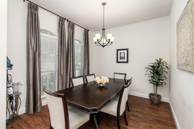 6126 Holly Crest Ln, Sachse, TX 75048 - dining space featuring a chandelier, healthy amount of natural light, dark wood-style flooring, and baseboards