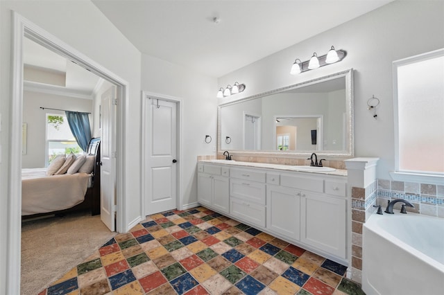 111 Blue Stem Ln, Aledo, TX 76008 - ensuite bathroom with stone finish flooring, double vanity, and a bath