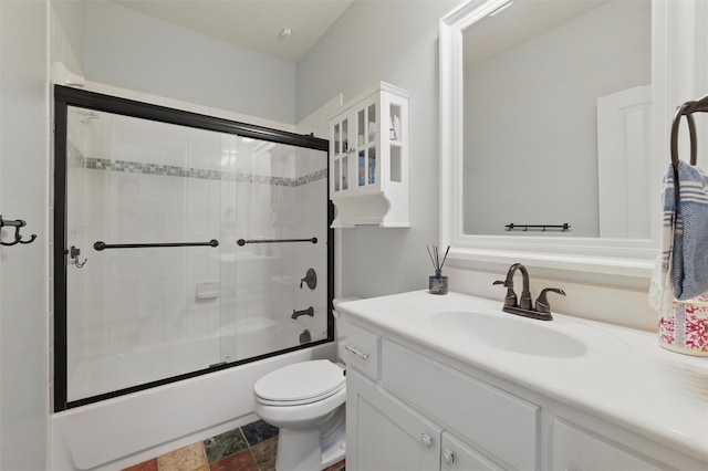 111 Blue Stem Ln, Aledo, TX 76008 - full bathroom with vanity, enclosed tub / shower combo, toilet, and stone finish flooring