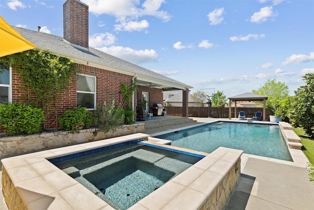 111 Blue Stem Ln, Aledo, TX 76008 - view of swimming pool with an in-ground hot tub, a gazebo, a patio area, and a fenced backyard