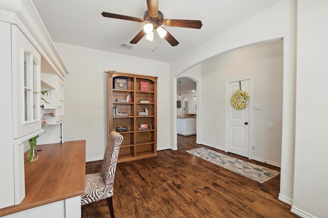111 Blue Stem Ln, Aledo, TX 76008 - unfurnished office featuring a ceiling fan, arched walkways, wood finished floors, and baseboards