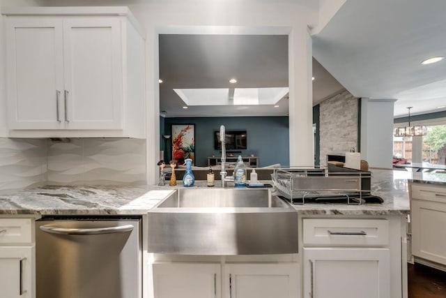 9178 Glen Springs Dr, Dallas, TX 75243 - kitchen with dishwasher, a sink, decorative backsplash, a tray ceiling, and white cabinetry