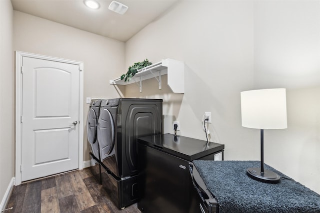 619 Comal Dr, Crandall, TX 75114 - laundry area with washer and dryer, dark wood finished floors, and baseboards