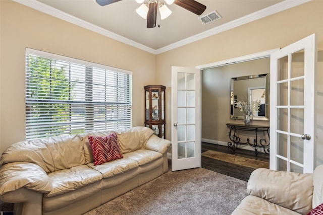 619 Comal Dr, Crandall, TX 75114 - living area featuring french doors, ornamental molding, ceiling fan, baseboards, and carpet