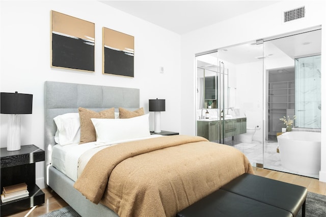 3130 N Harwood St Unit 903, Dallas, TX 75201 - bedroom with ensuite bath