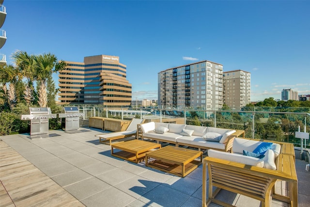 3130 N Harwood St Unit 903, Dallas, TX 75201 - view of patio / terrace with an outdoor hangout area, a grill, and a city view
