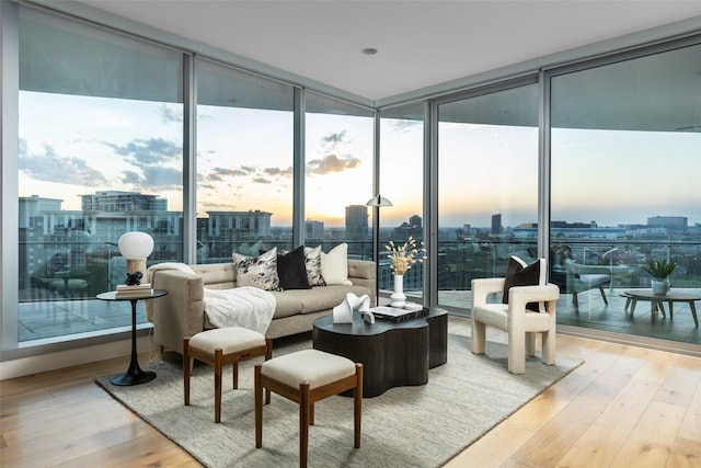3130 N Harwood St Unit 903, Dallas, TX 75201 - living room with a view of skyline, hardwood / wood-style floors, and expansive windows
