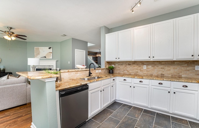 9305 Manassas Rdg, Mckinney, TX 75071 - kitchen with stainless steel dishwasher, a sink, open floor plan, a peninsula, and ceiling fan