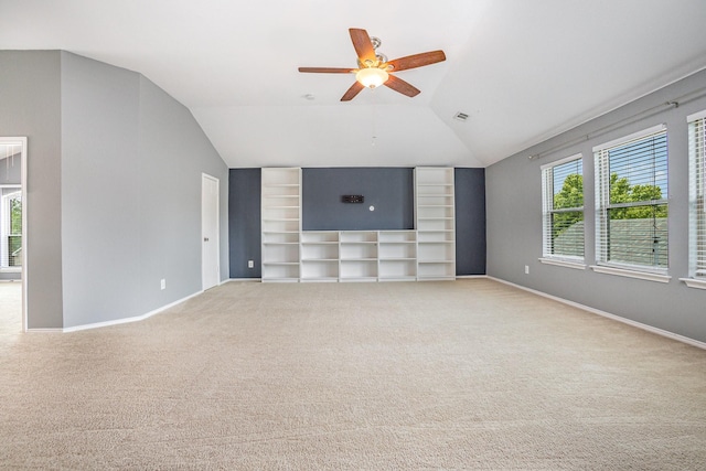 9305 Manassas Rdg, Mckinney, TX 75071 - unfurnished living room featuring vaulted ceiling, a ceiling fan, baseboards, light carpet, and built in features