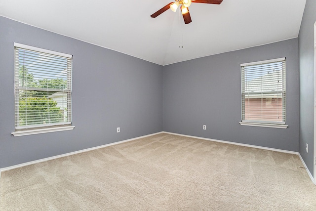 9305 Manassas Rdg, Mckinney, TX 75071 - carpeted spare room featuring ceiling fan, healthy amount of natural light, vaulted ceiling, and baseboards