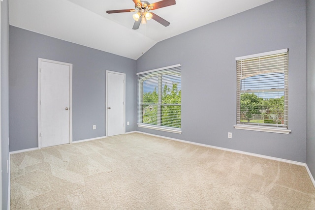 9305 Manassas Rdg, Mckinney, TX 75071 - spare room with a ceiling fan, baseboards, lofted ceiling, and carpet