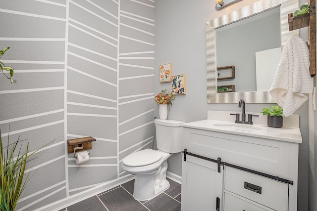 9305 Manassas Rdg, Mckinney, TX 75071 - bathroom featuring vanity, toilet, baseboards, and tile patterned flooring
