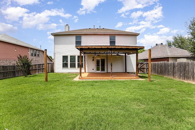 9305 Manassas Rdg, Mckinney, TX 75071 - rear view of property with ceiling fan, a patio area, and a chimney