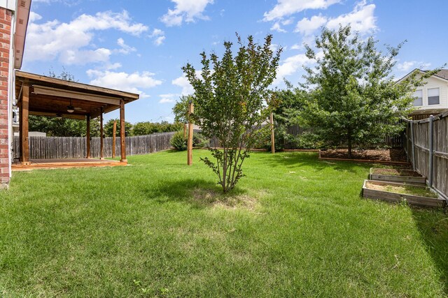 9305 Manassas Rdg, Mckinney, TX 75071 - view of yard with a garden and a ceiling fan
