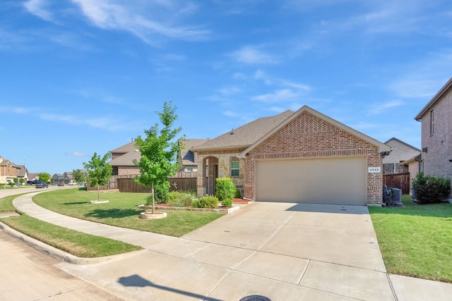 2346 Neff Ln, Forney, TX 75126 - view of front of property with brick siding, an attached garage, concrete driveway, roof with shingles, and a residential view