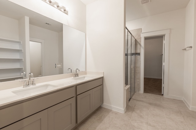 2506 Sun Grove Rd, Melissa, TX 75454 - bathroom featuring a tile shower, double vanity, baseboards, and tile patterned flooring