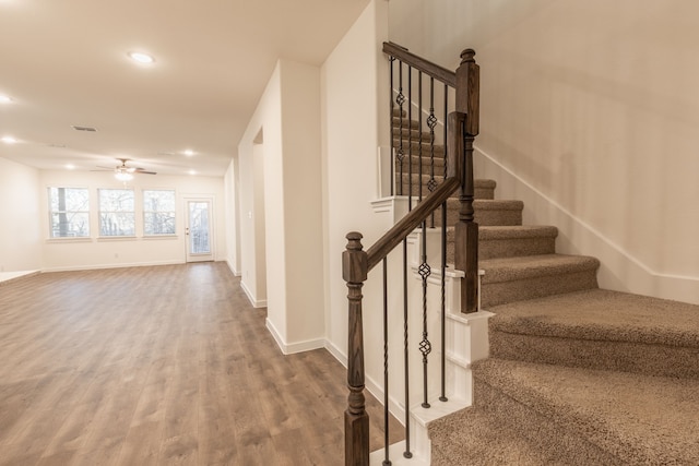 2506 Sun Grove Rd, Melissa, TX 75454 - staircase featuring wood finished floors, ceiling fan, recessed lighting, and baseboards
