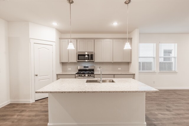 2506 Sun Grove Rd, Melissa, TX 75454 - kitchen featuring appliances with stainless steel finishes, a sink, baseboards, backsplash, and recessed lighting