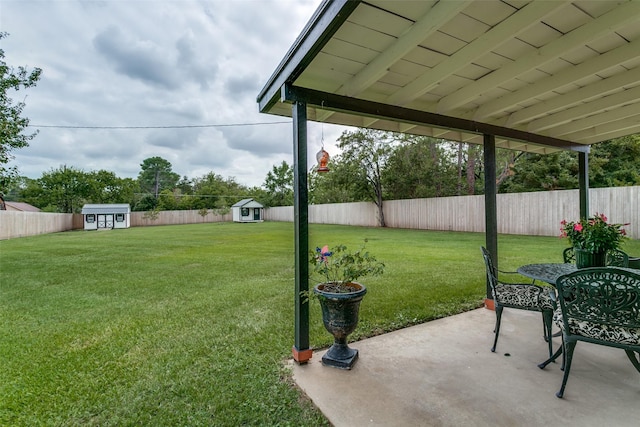 203 Oak Valley Dr, Colleyville, TX 76034 - view of yard with a storage unit, a patio, and an outdoor structure