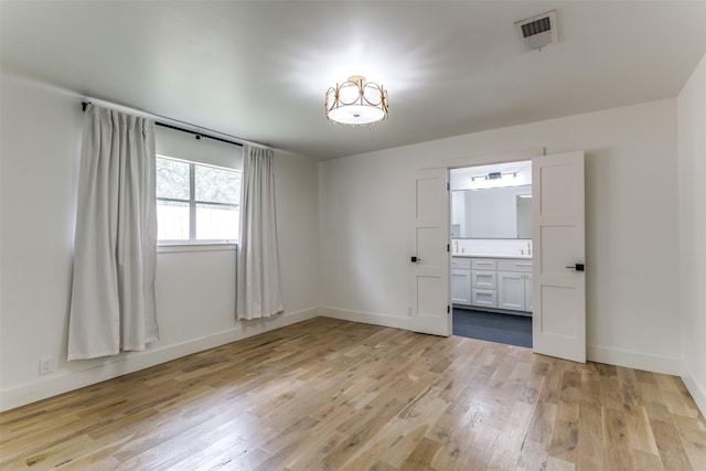 203 Oak Valley Dr, Colleyville, TX 76034 - empty room featuring light wood-type flooring and baseboards