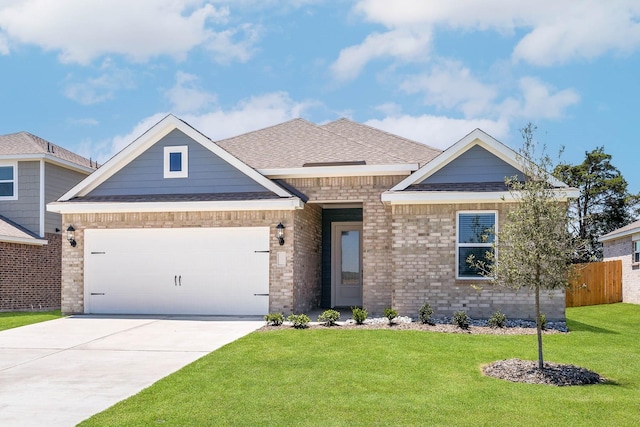 1005 Pecan Pl, Hutchins, TX 75141 - view of front of home with driveway, a garage, brick siding, and roof with shingles
