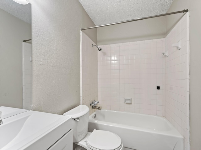 638 Matador Dr, Little Elm, TX 75068 - bathroom with a textured wall, a textured ceiling, toilet, vanity, and shower / washtub combination