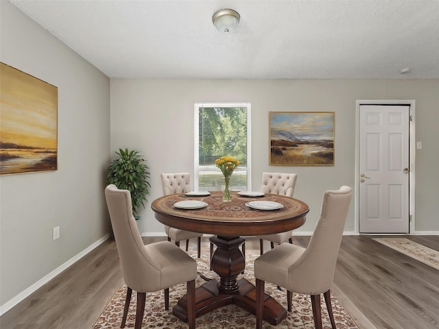 638 Matador Dr, Little Elm, TX 75068 - dining room with wood finished floors and baseboards
