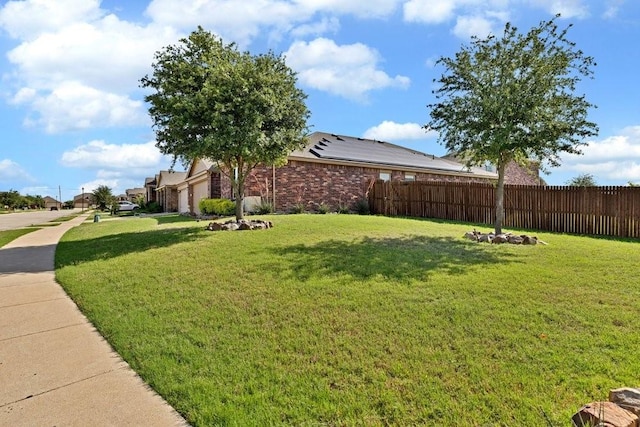 1302 Copper St, Princeton, TX 75407 - view of yard with an attached garage