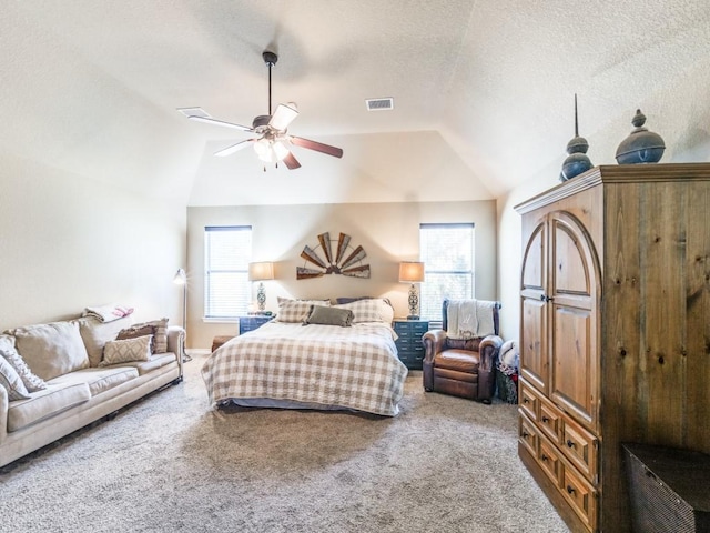 2103 Ridgewood Dr, Bridgeport, TX 76426 - bedroom featuring vaulted ceiling, carpet floors, a textured ceiling, and a ceiling fan