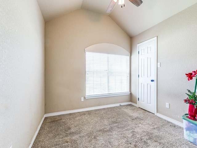 2103 Ridgewood Dr, Bridgeport, TX 76426 - spare room with carpet, lofted ceiling, a ceiling fan, and baseboards