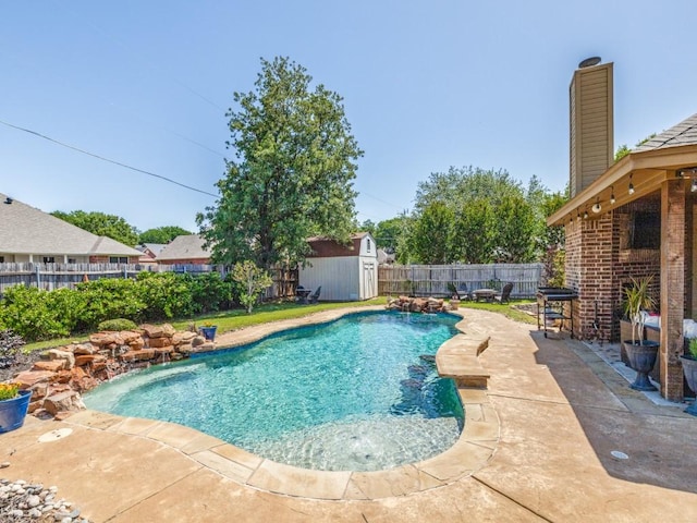2103 Ridgewood Dr, Bridgeport, TX 76426 - view of pool with a fenced backyard, a storage unit, a patio area, and an outdoor structure