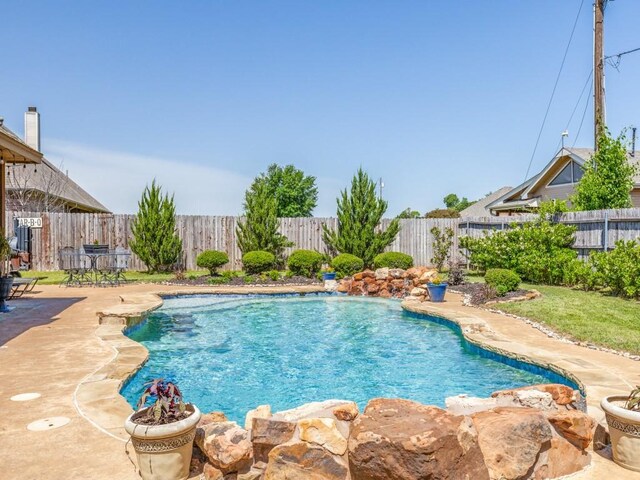 2103 Ridgewood Dr, Bridgeport, TX 76426 - view of pool featuring a fenced backyard and a patio area