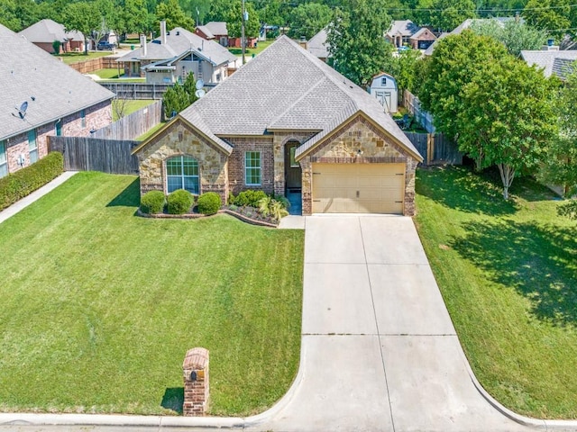 2103 Ridgewood Dr, Bridgeport, TX 76426 - french country style house featuring stone siding, a garage, concrete driveway, and a residential view