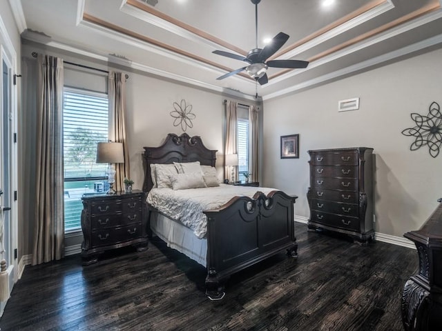 1650 Winding Creek Ln, Rockwall, TX 75032 - bedroom with a tray ceiling, ornamental molding, dark wood-style flooring, a ceiling fan, and baseboards