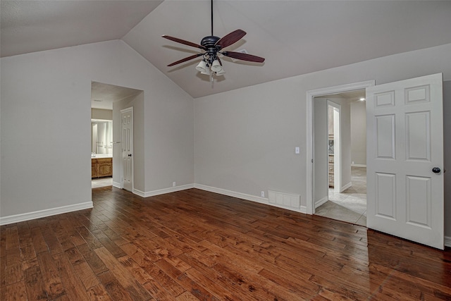 6109 Rayburn Ct, Fort Worth, TX 76133 - unfurnished room featuring hardwood / wood-style floors, a ceiling fan, lofted ceiling, and baseboards