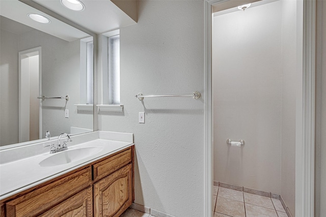 6109 Rayburn Ct, Fort Worth, TX 76133 - bathroom featuring vanity, tile patterned flooring, and baseboards