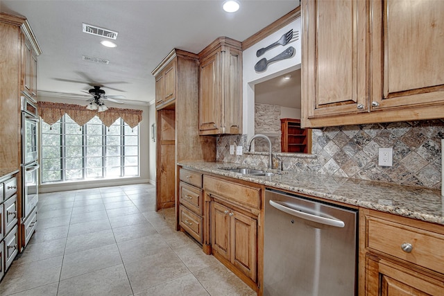 6109 Rayburn Ct, Fort Worth, TX 76133 - kitchen with appliances with stainless steel finishes, a sink, a ceiling fan, backsplash, and light stone countertops